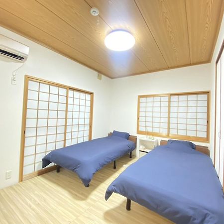 島の宿　結んちゅ Амами Екстериор снимка